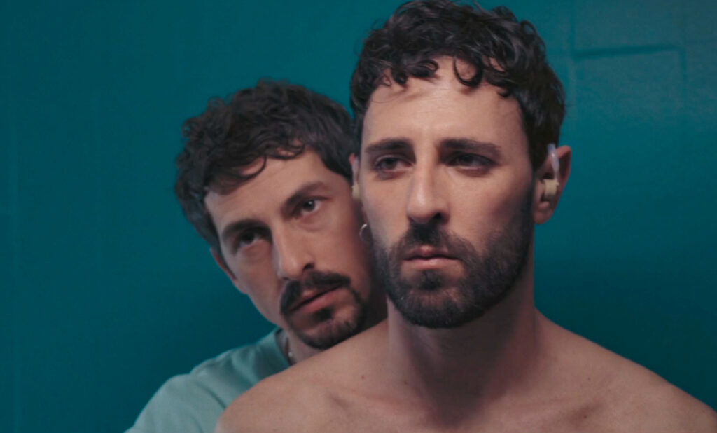 In Your Arms (Malanova) by Roberto Cuzzillo: A Couple Facing HIV